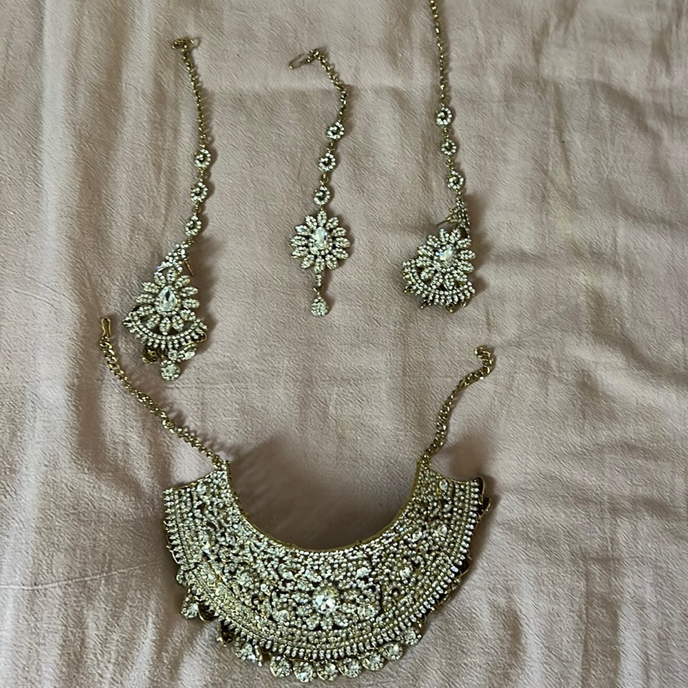 White and gold Indian jewelry